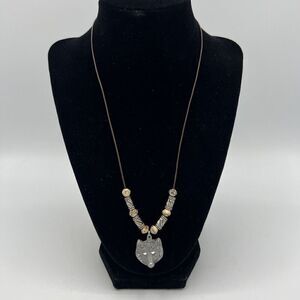 Sisk Wolf Pendant on a Brown Leather Necklace With Beads